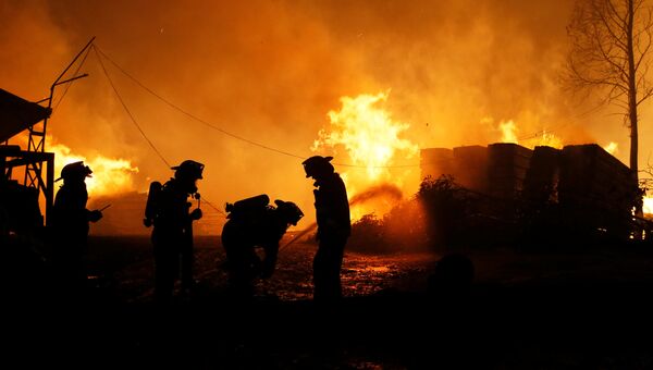 Лесные пожары полностью уничтожили город Санта-Ольга в чилийском регионе Мауле, 26 января 2017