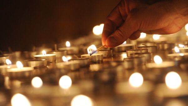 Церемония зажжения свечей. Архивное фото