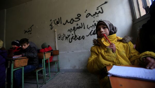 Дети на уроке в городе Алеппо