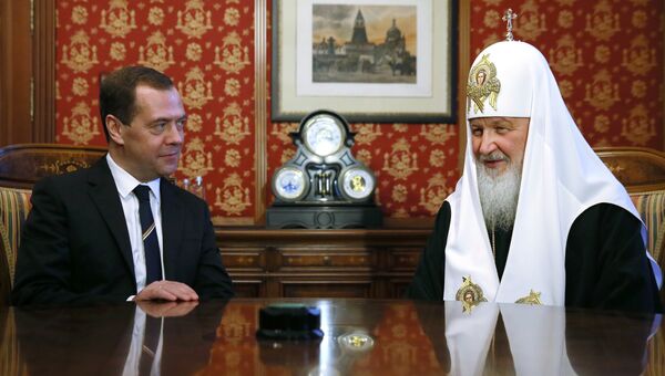 Председатель правительства РФ Дмитрий Медведев и патриарх Московский и всея Руси Кирилл. Архивное фото