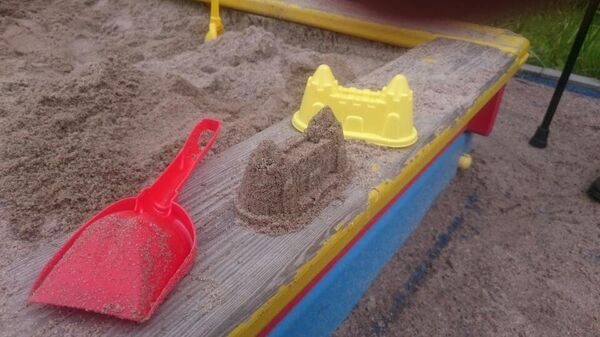 Песочница на детской площадке. Архивное фото