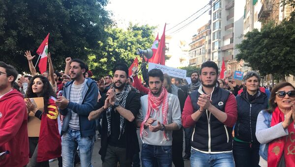 Сторонники компартии Ливана проводят мирную демонстрацию в центре Бейрута