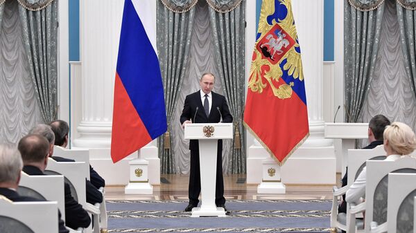 Президент РФ Владимир Путин выступает на церемонии вручения премий президента РФ. Архивное фото