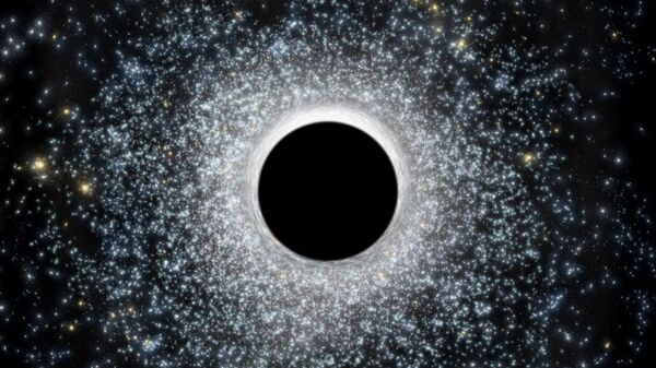 Так художник представил то, как промежуточная черная дыра искривляет свет звездного скопления