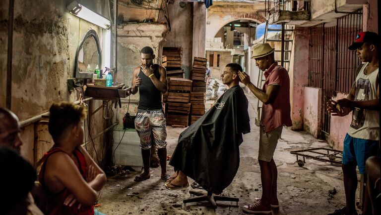 Cuba on the Edge of Change фотографа Tomas Munita занявшего первое место в категории Повседневная жизнь в фотоконкурсе World Press Photo
