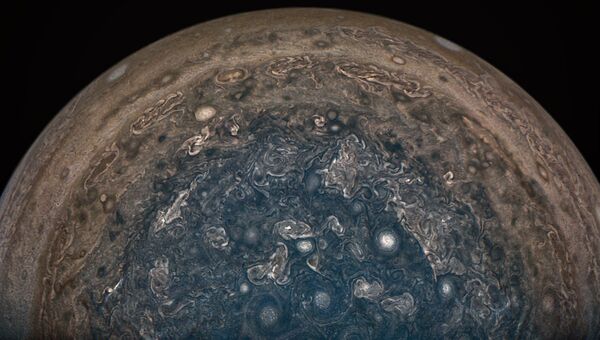 Шторм на Юпитере, фотография с зонда Juno