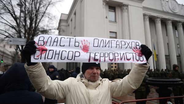 Участник митинга сторонников торговой блокады Донбасса в Киеве. Архивное фото