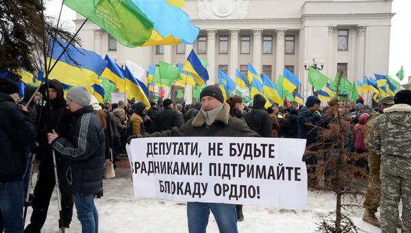 Участник митинга сторонников торговой блокады Донбасса в Киеве. 21 февраля 2017