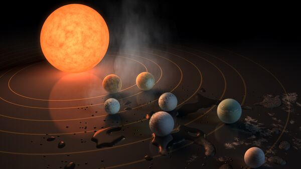 Так художник представил себе семь планет системы TRAPPIST-1