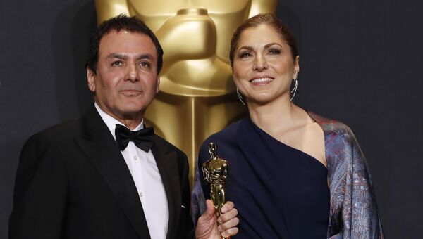 Асгар Фархади и Ануше Ансари на церемонии Оскар