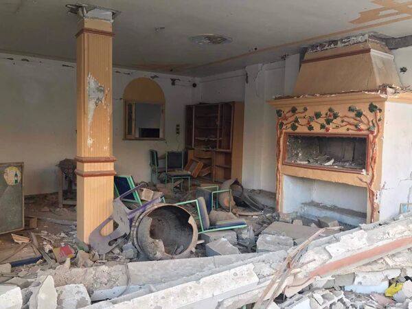 Разрушенный в результате боевых действий дом в жилой части города Пальмира в сирийской провинции Хомс