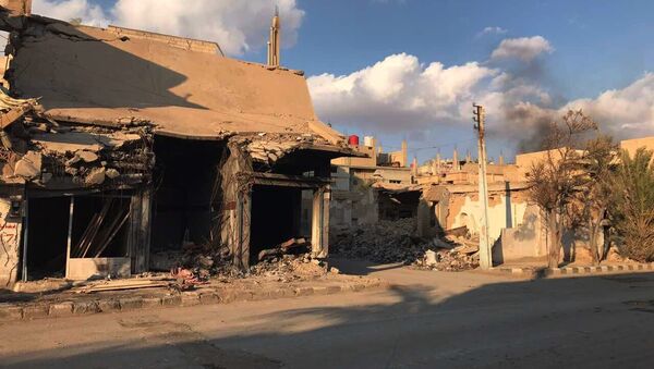 Разрушенные в результате боевых действий дома в жилой части города Пальмира в сирийской провинции Хомс. Максимально возможное качество. Архивное фото