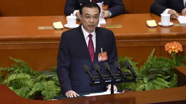 Премьер-министр Китая Ли Кэцян на заседании весенней сессии парламента в Китае. 5 марта 2017 года