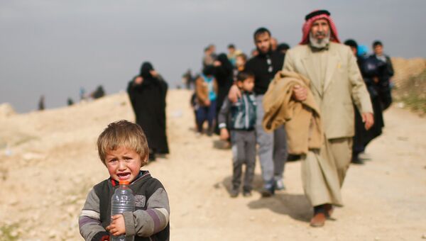 Маленький беженец в западном Мосуле
