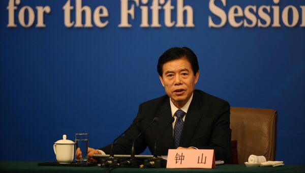 Министр коммерции Китая Чжун Шань на пресс-конференции в Пекине, 11 марта 2017