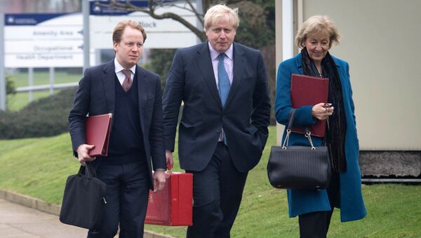 Премьер-министр Великобритании Тереза Мэй, глава британского МИД Борис Джонсон и Бен Гаммер. Архивное фото