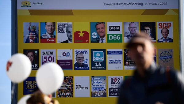 Плакат с кандидатами на предстоящих парламентский выборах в Нидерландах