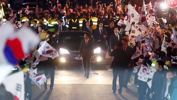 Отъезд президента Южной Кореи Пак Кын Хе из официальной резиденции. 12 марта 2017 года