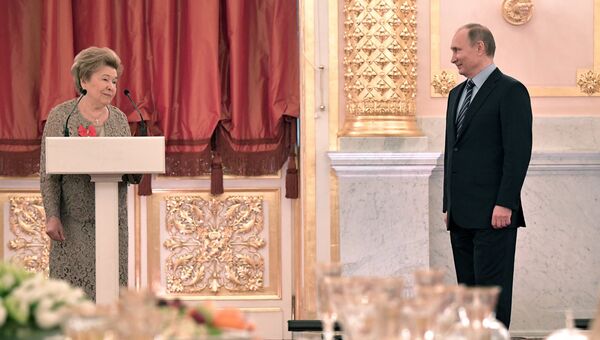 Президент РФ Владимир Путин и вдова первого президента РФ Б. Ельцина Наина Ельцина на торжественном приеме. 14 марта 2017