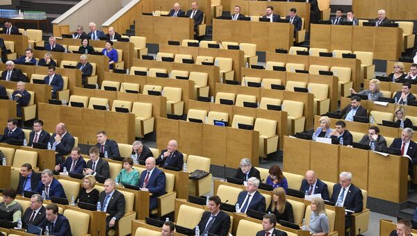 Пустующие кресла депутатов фракции ЛДПР на пленарном заседании Государственной Думы РФ. 15 марта 2017