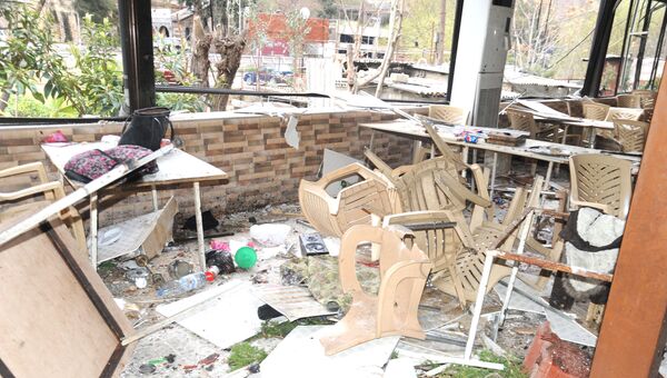 Место взрыва на территории ресторана в районе Ар-Рабва на северо-западе Дамаска. 15 марта 2017