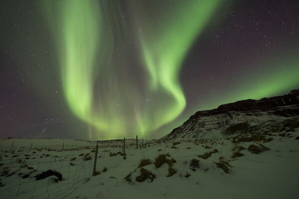 Северное сияние в небе над Бифростом, Западная Исландия