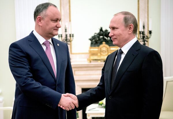 Президент РФ Владимир Путин и президент Республики Молдова Игорь Додон во время встречи. 17 марта 2017 Президент РФ Владимир Путин и президент Республики Молдова Игорь Додон во время встречи. 17 марта 2017