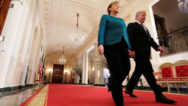 Канцлер Германии Ангела Меркель и президент США Дональд Трамп во время встречи в Вашингтоне. 17 марта 2017 года