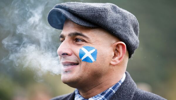 Участник марша в Эдинбурге за независимость Шотландии. Октябрь 2016 года