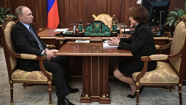 Президент РФ Владимир Путин и председатель Центрального банка РФ Эльвира Набиуллина во время встречи. 22 марта 2017