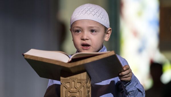 Чтение Корана на фестивале Корана в Московской соборной мечети. Архивное фото.