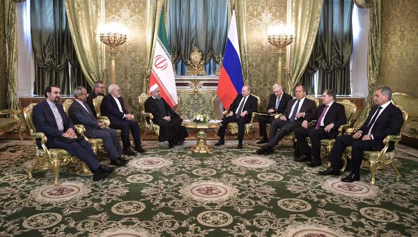 Президент РФ Владимир Путин и президент Исламской Республики Иран Хасан Роухани во время встречи в Москве. 28 марта 2017 года