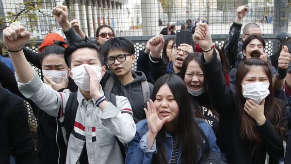 Акция протеста против убийства французскими полицейскими китайца в Париже