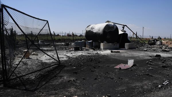 Последствия ракетного удара США по авиабазе Шайрат в Сирии.