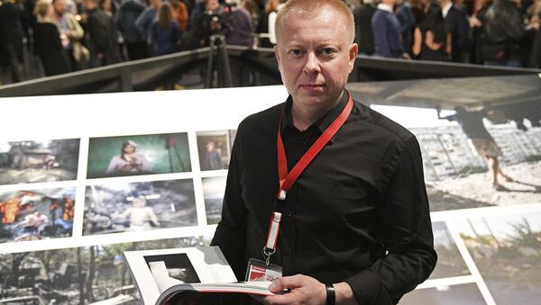 Специальный фотокорреспондент МИА Россия сегодня Валерий Мельников на открытии выставки победителей World Press Photo в Амстердаме