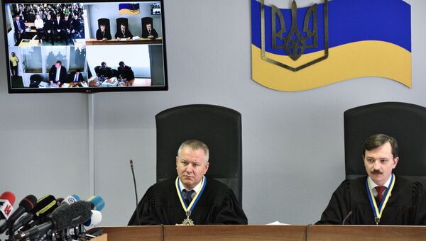 Судьи на заседании Оболонского районного суда Киева, где рассматривается дело о государственной измене экс-президента Украины Виктора Януковича. Архивное фото