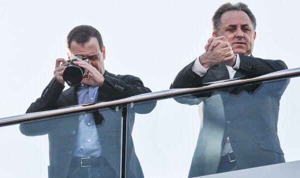 Премьер-министр РФ Дмитрий Медведев и заместитель председателя правительства РФ Виталий Мутко на российском этапе чемпионата мира Формула-1
