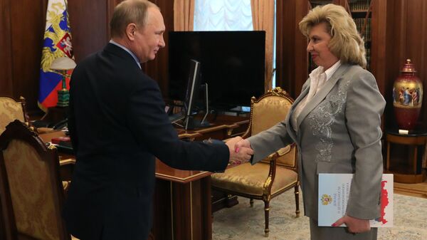 Президент РФ Владимир Путин и уполномоченный по правам человека Татьяна Москалькова во время встречи. 5 мая 2017