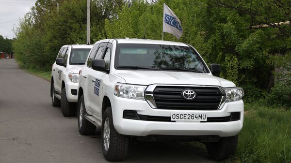 Автомобили ОБСЕ в Донецке. Архивное фото