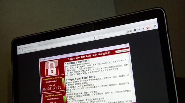 Экран ноутбука с предупреждением об атаке вредоносного вируса в Китае. 13 мая 2017