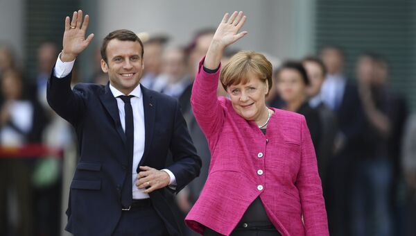 Канцлер Германии Ангела Меркель и президент Франции Эммануэль Макрон во время встречи в Берлине