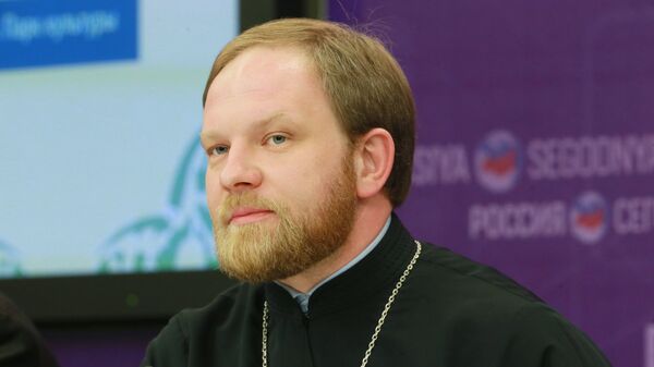 Пресс-секретарь патриарха Кирилла священник Александр Волков на пресс-конференции в МИА Россия сегодня 
