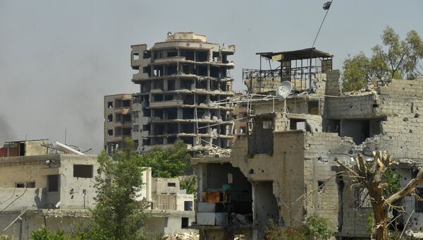 Разрушенные здания в пригороде Дамаска. Архивное фото