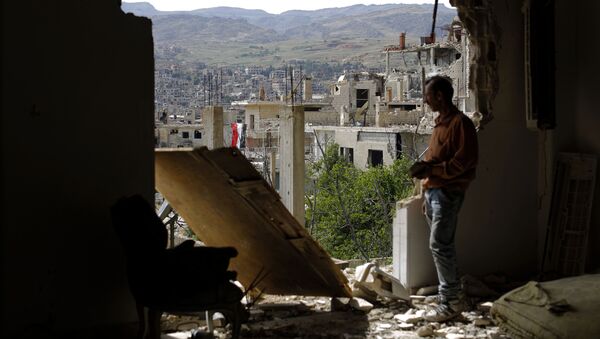 Последствия авиаударов в сирийском городе Забадани