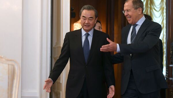 Министр иностранных дел РФ Сергей Лавров и министр иностранных дел Китая Ван И во время встречи в Москве. 26 мая 2017