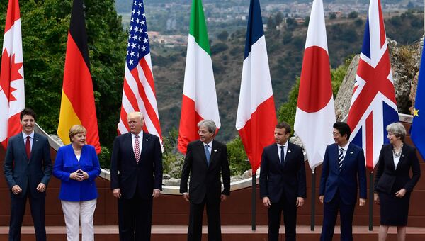 Лидеры стран Большой семерки во время саммита G7 в Таормине, Италия. 26 мая 2017