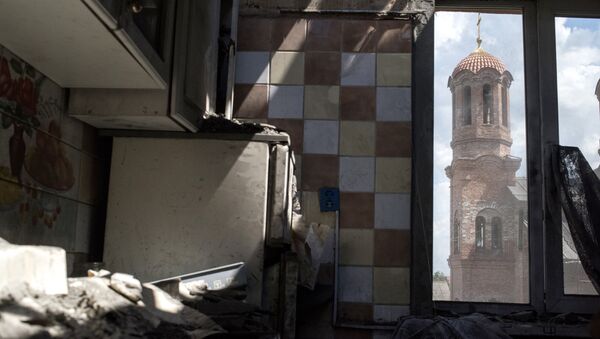 Последствия обстрела поселка Никитовка в Донецкой области. Архивное фото