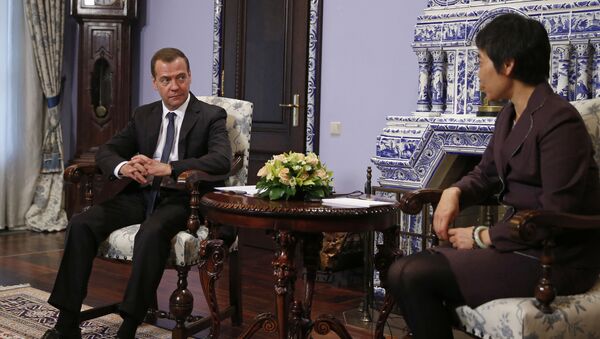 Премьер-министр России Дмитрий Медведев и генеральный секретарь ИКАО Фан Лю