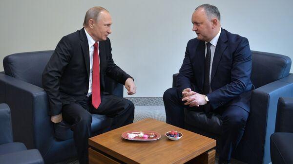Президент РФ Владимир Путин и президент Республики Молдова Игорь Додон. Архивное фото