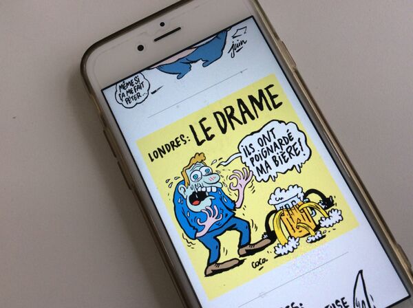 Карикатура в журнале Charlie Hebdo Карикатура в журнале Charlie Hebdo